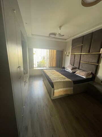 Living Room in 2 BHK Apartment at Paramount Towers, Khar West – for Rent