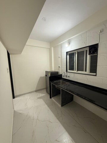 Kitchen in 1 RK Apartment at Wadgaon Sheri – for Rent