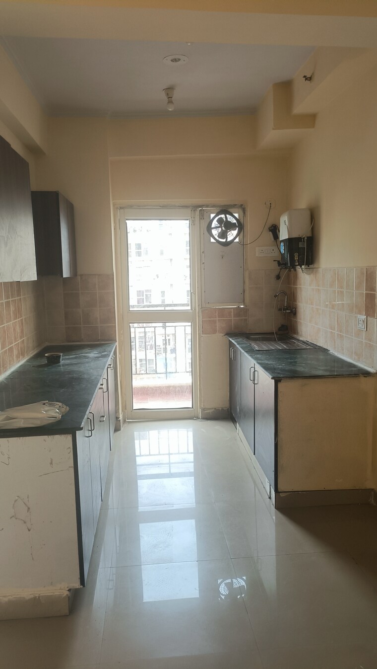 Kitchen, aims-golf-city 2 Bedroom 950 Sq.Ft. Apartment In Sector 75 Noida 9151688