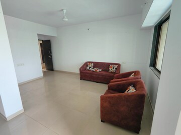 Living Room in 2 BHK Apartment at Satyam Serenity, Wadgaon Sheri – for Rent