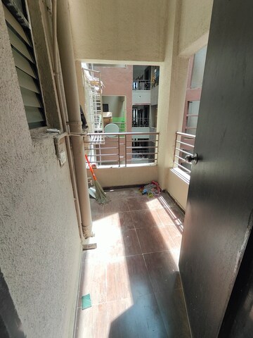 Balcony in 2 BHK Apartment at Satyam Serenity, Wadgaon Sheri – for Rent