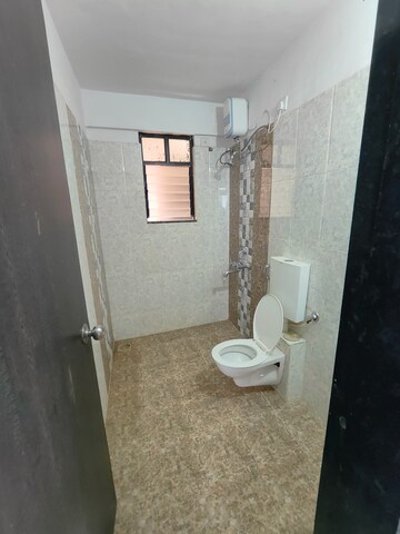 Bathroom in 2 BHK Apartment at Satyam Serenity, Wadgaon Sheri – for Rent
