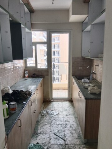 Kitchen in 3 BHK Apartment at Amrapali Crystal Homes, Sector 76 – for Rent