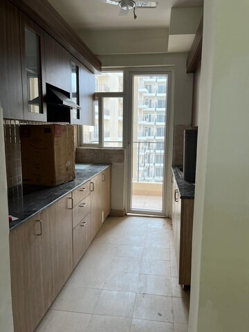 Kitchen in 3 BHK Apartment at Amrapali Crystal Homes, Sector 76 – for Rent