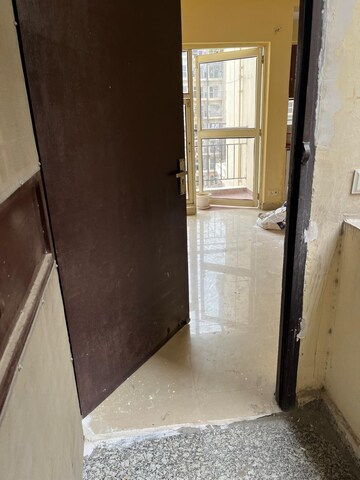 Building Lobby in 3 BHK Apartment at Amrapali Crystal Homes, Sector 76 – for Rent
