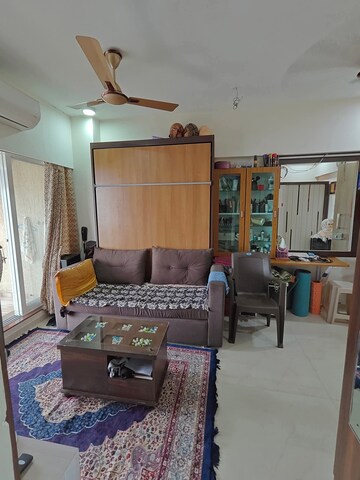 Living Room in 1 BHK Apartment at MK Gabino, Andheri West – for Sale