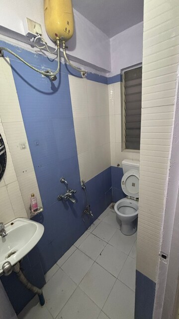 Bathroom in 2 BHK Apartment at Elegant Heritage, Viman Nagar – for Rent