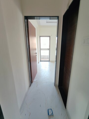 Building Lobby in 1 BHK Apartment at Wadgaon Sheri – for Rent
