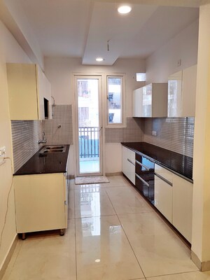 Kitchen in 3 BHK Apartment at Fortune Victoria Heights, Dhakoli – for Sale