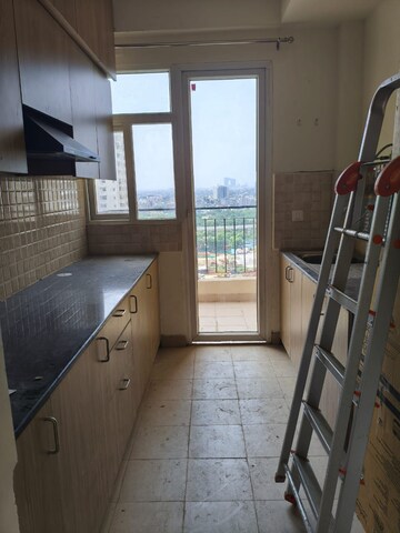 Kitchen in 3 BHK Apartment at Amrapali Crystal Homes, Sector 76 – for Rent