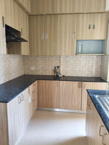 Kitchen in 3 BHK Apartment at Amrapali Crystal Homes, Sector 76 – for Rent