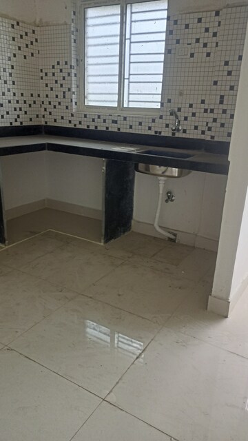 Kitchen in 2 BHK Apartment at Kristi Villa, Chinar Park – for Sale