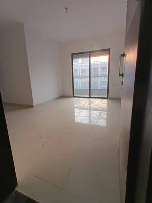 Living Room in 2 BHK Apartment at Roshan Milestone, Tathawade – for Rent