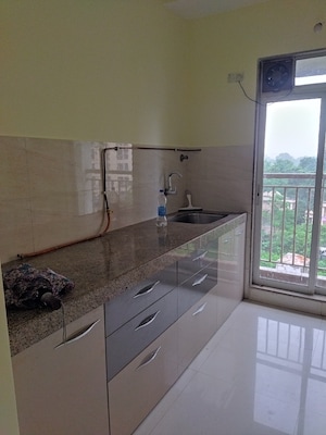 Kitchen in 1 BHK Apartment at Metropolis Aquaris Phase 2, Kasarvadavali – for Sale