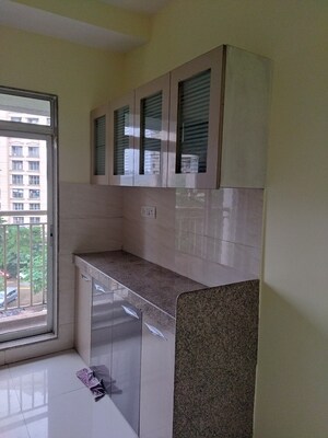Kitchen in 1 BHK Apartment at Metropolis Aquaris Phase 2, Kasarvadavali – for Sale