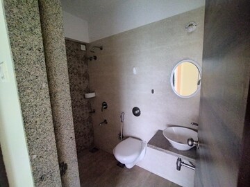Bathroom in 1 BHK Apartment at Metropolis Aquaris Phase 1, Kasarvadavali – for Rent