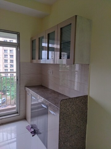 Kitchen in 1 BHK Apartment at Metropolis Aquaris Phase 1, Kasarvadavali – for Rent