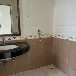 Bathroom in 3 BHK Apartment at Parsvnath Green Ville, Dhani – for Sale