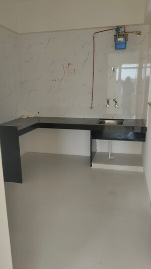 Kitchen in 2 BHK Apartment at Pristine Greens, Moshi – for Rent