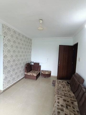 Living Room in 2 BHK Apartment at Yashraj Park CHS, Kasarvadavali – for Rent
