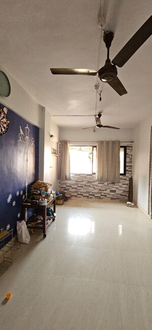 Living Room in 1 BHK Apartment at Kakad Paradise Phase 1, Mira Road – for Sale