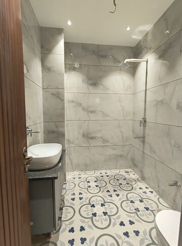 Bathroom in 4 BHK Builder Floor at Green Fields Colony – for Rent