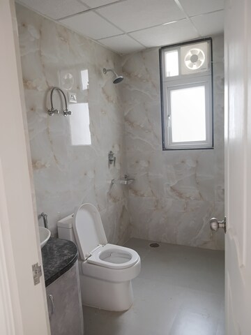 Bathroom in 2 BHK Apartment at Sushant Golf City – for Rent
