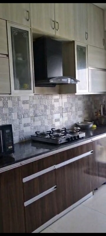 Kitchen in 3 BHK Apartment at Samridhi Grand Avenue, Tech Zone 4 Greater Noida – for Rent
