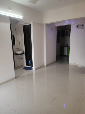Living Room in 2 BHK Apartment at Sankalp Vastu, Charholi Budruk – for Rent