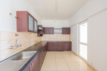 Kitchen in 3 BHK Apartment at Brigade Metropolis, Mahadevpura – for Rent