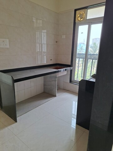 Kitchen in 1.5 BHK Apartment at Rajshree Flora, Chembur – for Rent