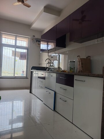 Kitchen in 2 BHK Apartment at Puranik Rumah Bali, Ghodbunder Road – for Rent