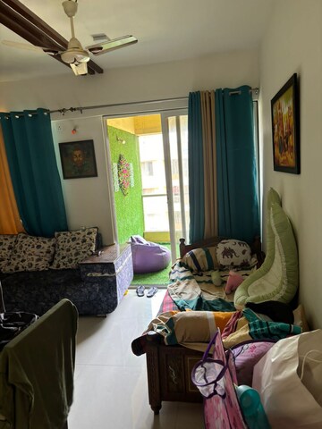 Living Room in 2 BHK Apartment at Ravinanda Trinity, Wagholi – for Sale