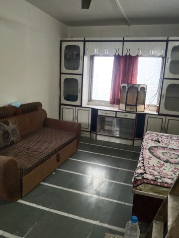 Living Room in 1 BHK Apartment at Jagrut CHS, Gokhalenagar – for Rent