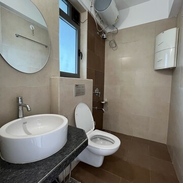 Bathroom in 4 BHK Apartment at Rustomjee Summit, Datta Pada – for Rent