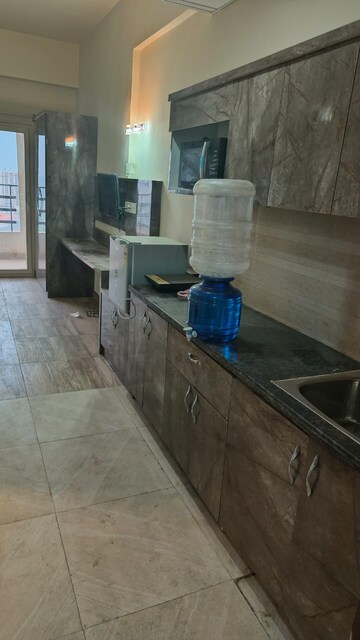 Kitchen in 1 BHK Apartment at Paramount Golfforeste, Zeta I Greater Noida – for Rent