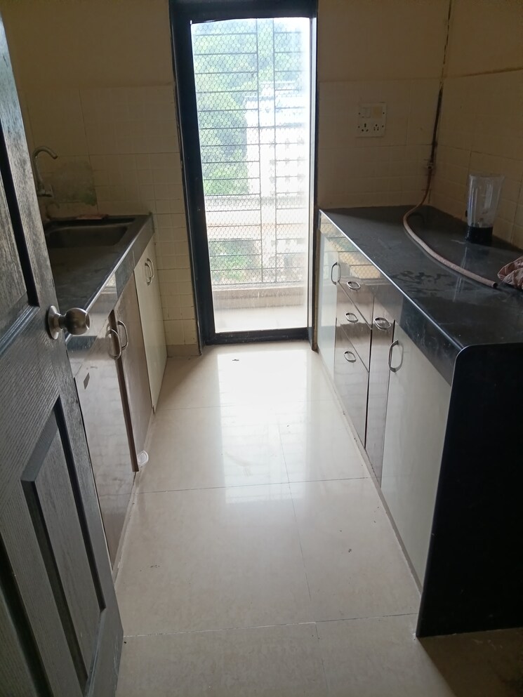 Kitchen, lalani-residency 2 Bedroom 600 Sq.Ft. Apartment In Kavesar Thane 9153428