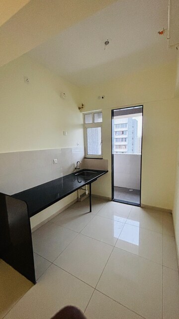 Kitchen in 1 BHK Apartment at Kolte Patil R10, Hinjewadi – for Rent