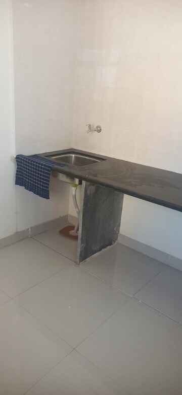 Kitchen in 2 BHK Apartment at KM Horizon Flora, Ghodbunder Road – for Sale