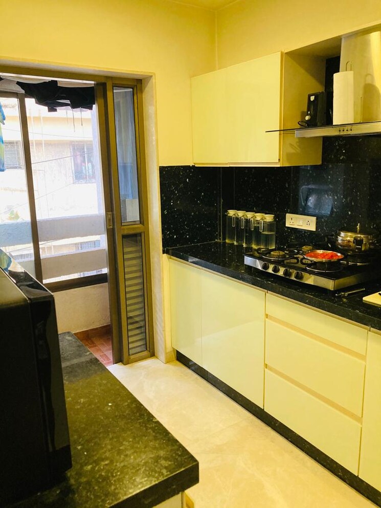 Kitchen, eminente-i 3 Bedroom 1850 Sq.Ft. Apartment In Khar West Mumbai 9153552