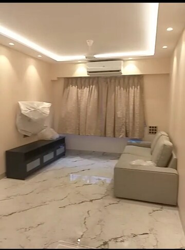 Living Room in 1 BHK Apartment at Priyadarshani CHS, Prabhadevi – for Rent