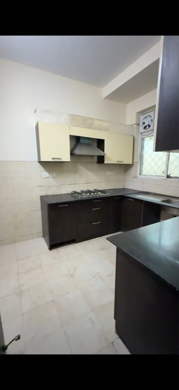 Kitchen in 3 BHK Builder Floor at Ansal API Esencia, Sector 67 – for Sale