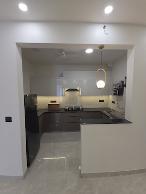 Kitchen in 3 BHK Builder Floor at Ansal Sushant Floors, Sushant Lok ii – for Sale