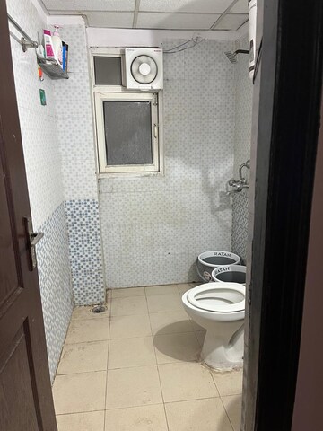 Bathroom in 2 BHK Apartment at Aims Golf City, Sector 75 – for Rent