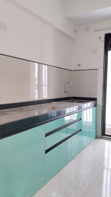 Kitchen in 1.5 BHK Apartment at Runwal My City, Dombivli East – for Rent