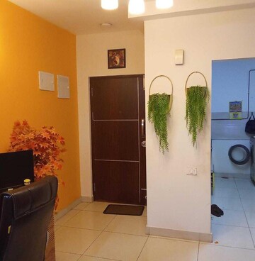 Living Room in 1 BHK Apartment at Brigade Buena Vista, Budigere – for Sale
