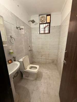 Bathroom in 2 BHK Apartment at Chattarpur – for Sale