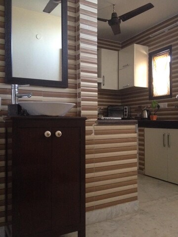 Kitchen in 1 RK Builder Floor at Lajpat Nagar I – for Rent