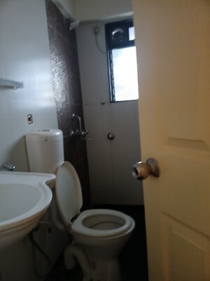 Bathroom in 2 BHK Apartment at Lalani Residency, Kavesar – for Sale