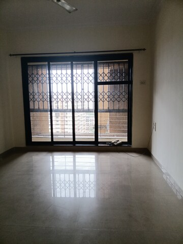 Room in 2 BHK Apartment at Lalani Residency, Kavesar – for Sale